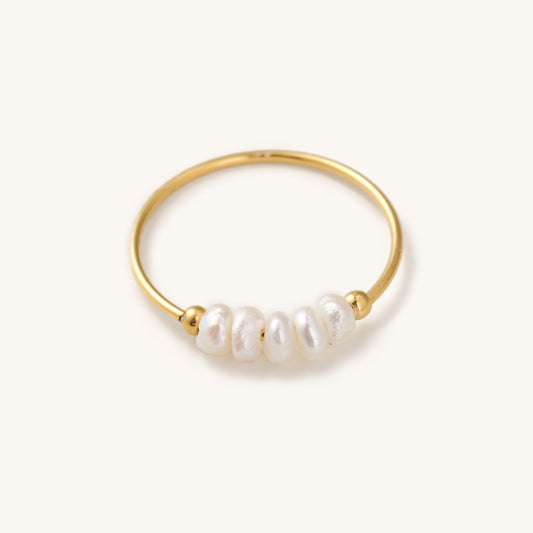 dainty gold ring with a string of small real pearls