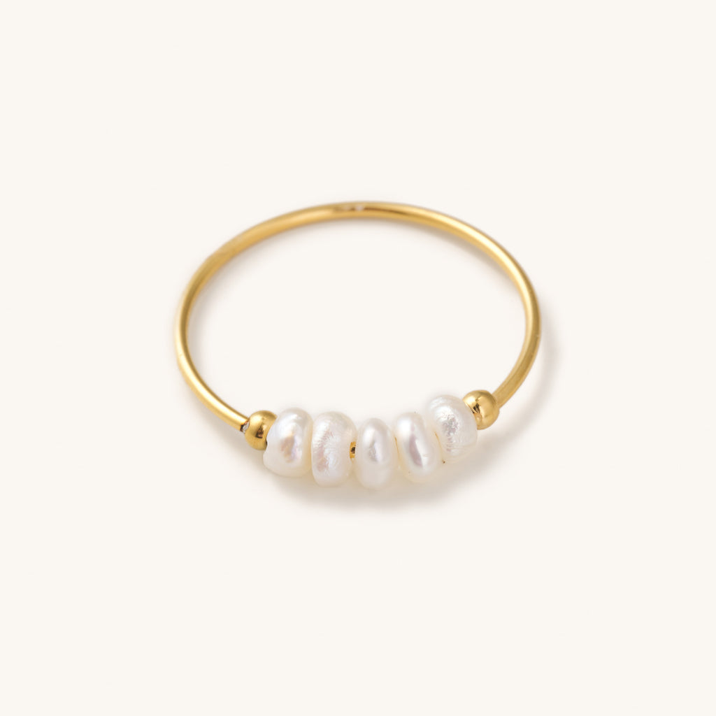 dainty gold ring with a string of small real pearls