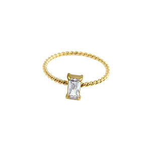 Gold twist bank ring with a clear center stone